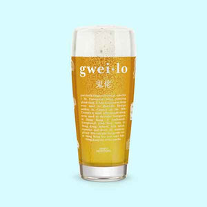 A 50cl Gweilo beer glass with the gweilo definition on the front. On a light blue background.